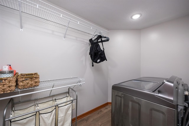 4110 140th St, Urbandale, IA 50323 - laundry area featuring recessed lighting, baseboards, wood finished floors, laundry area, and washer and clothes dryer