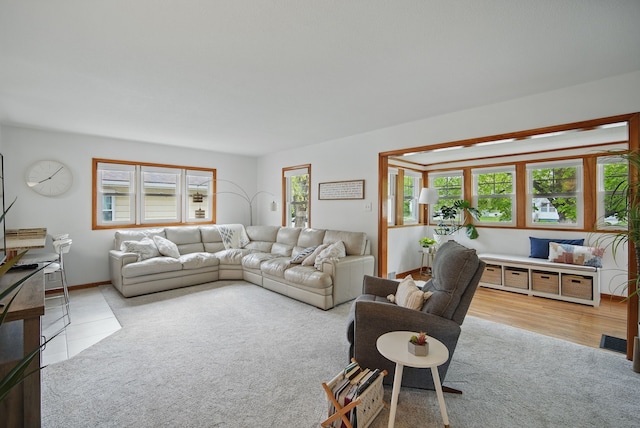 carpeted living room featuring visible vents