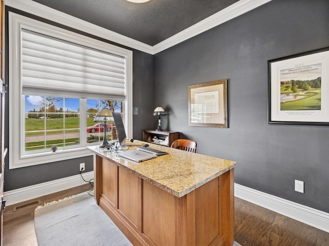office area featuring wood finished floors, crown molding, a textured ceiling, visible vents, and baseboards