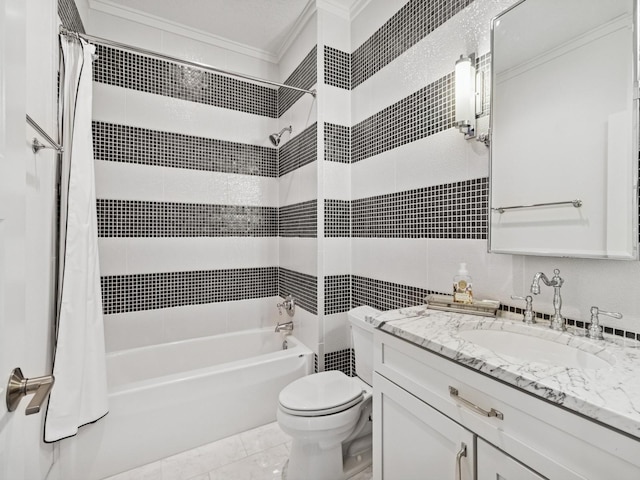 bathroom featuring tile walls, toilet, marble finish floor, crown molding, and shower / bath combo