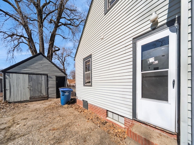 view of property exterior featuring an outdoor structure