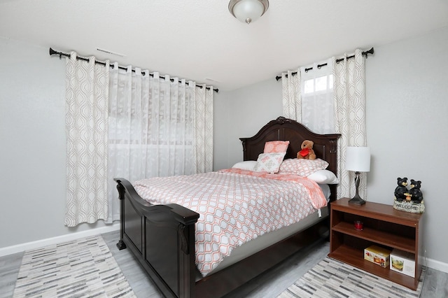 bedroom with baseboards