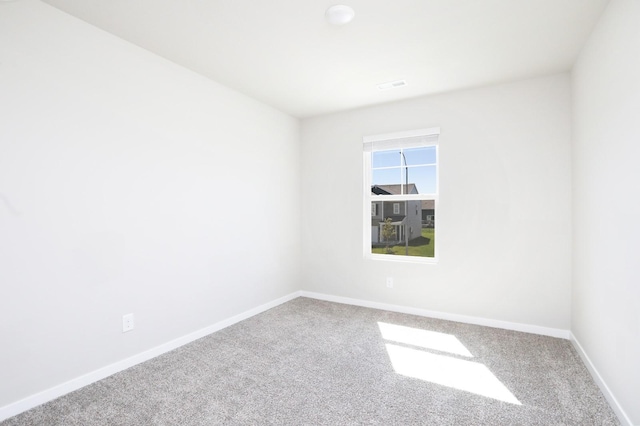 4207 NW Cedarwood Dr, Ankeny, IA 50023 - empty room with carpet floors and baseboards
