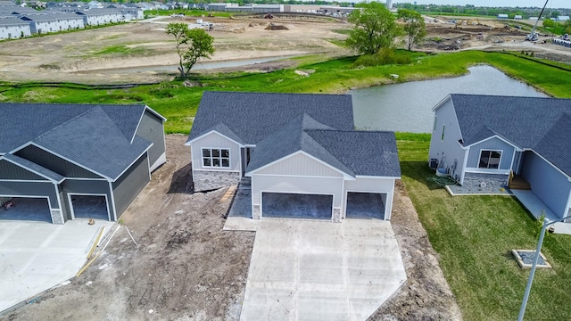 955 11th St, Waukee, IA 50263 - view from above of property with a large body of water