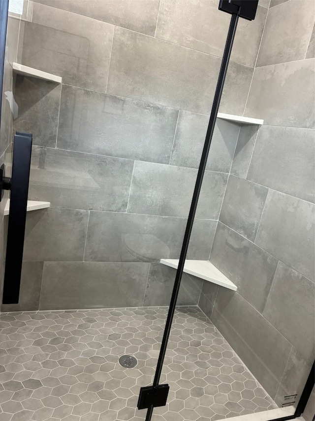 full bathroom with a shower stall