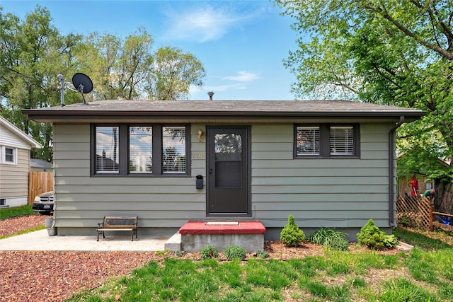 2216 Lay St, Des Moines, IA 50317 - view of front facade featuring fence and a patio area