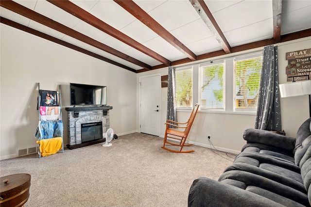 2216 Lay St, Des Moines, IA 50317 - carpeted living room with baseboards and a fireplace