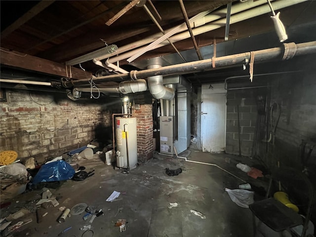 unfinished basement with brick wall, water heater, and heating unit