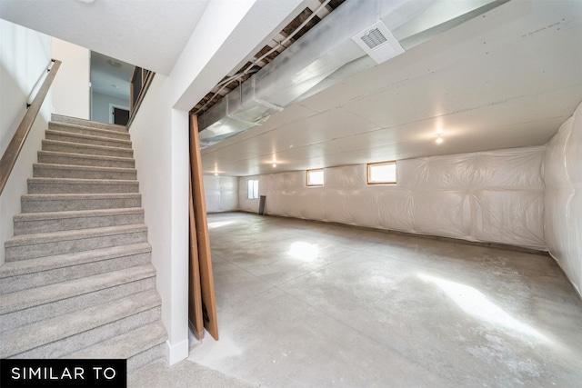 below grade area with stairway and visible vents