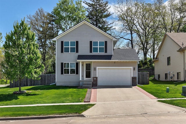 5301 SE 27th St, Des Moines, IA 50320 - traditional-style home with concrete driveway and a garage