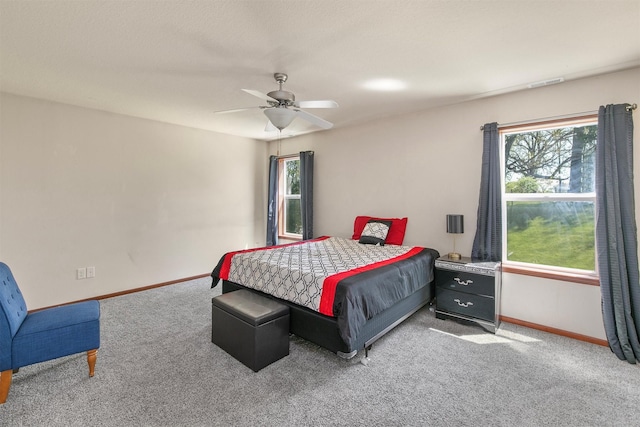 5301 SE 27th St, Des Moines, IA 50320 - bedroom with carpet, baseboards, and ceiling fan