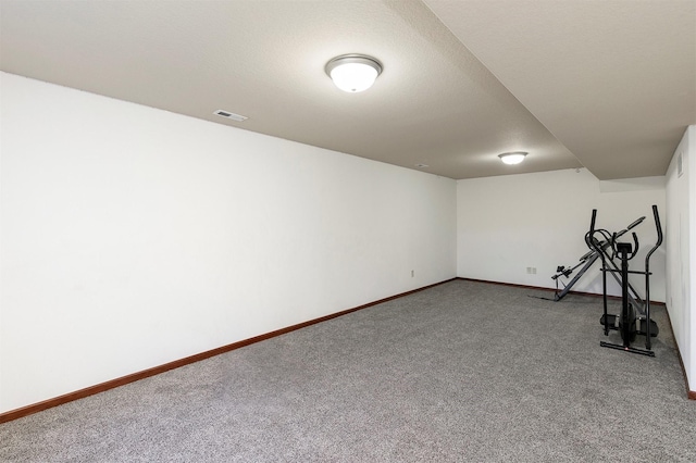 5301 SE 27th St, Des Moines, IA 50320 - exercise area featuring carpet flooring and baseboards