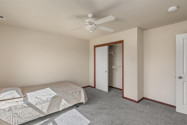 5301 SE 27th St, Des Moines, IA 50320 - carpeted bedroom featuring baseboards, ceiling fan, and a closet