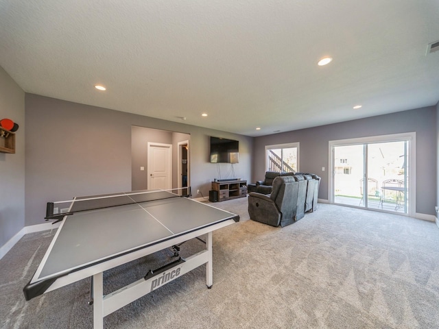 recreation room featuring carpet flooring and recessed lighting