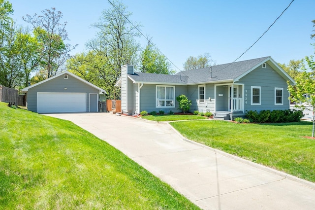 ranch-style home featuring a chimney, an outbuilding, fence, a detached garage, and a front lawn