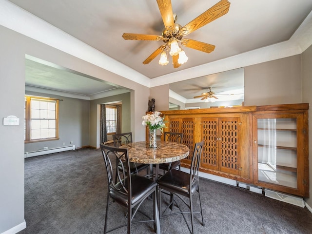 dining room with baseboards, a baseboard radiator, a ceiling fan, and carpet floors