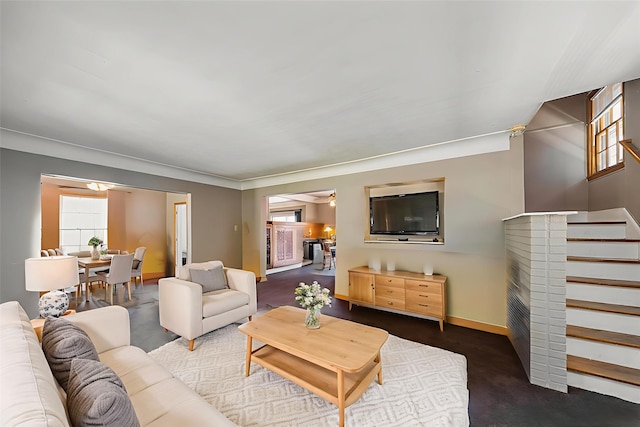 3812 Kingman Blvd, Des Moines, IA 50311 - carpeted living area featuring healthy amount of natural light and stairs