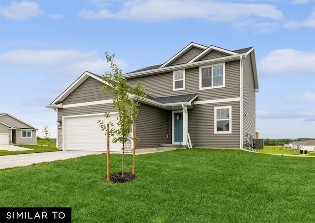 4112 NE 5th St, Ankeny, IA 50021 - craftsman-style house featuring central air condition unit, driveway, a front yard, and an attached garage