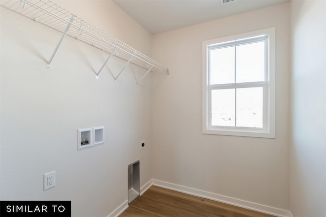 4112 NE 5th St, Ankeny, IA 50021 - laundry area with wood finished floors, laundry area, electric dryer hookup, baseboards, and hookup for a washing machine