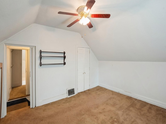 325 W 8th St S, Newton, IA 50208 - bonus room featuring lofted ceiling, carpet floors, and ceiling fan