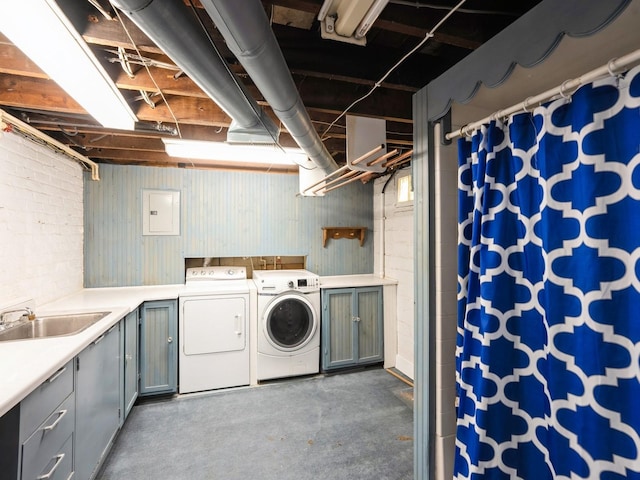 325 W 8th St S, Newton, IA 50208 - laundry room featuring independent washer and dryer, cabinet space, and electric panel
