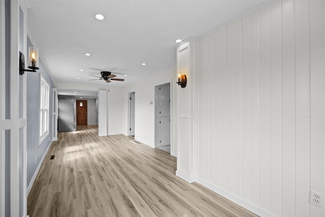 905 E 8th St S, Newton, IA 50208 - spare room featuring light wood-type flooring, recessed lighting, baseboards, and ceiling fan