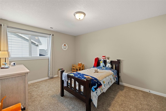 270 NE Prairie Wolf Dr, Waukee, IA 50263 - bedroom with light carpet, a textured ceiling, and baseboards