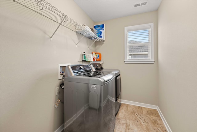270 NE Prairie Wolf Dr, Waukee, IA 50263 - washroom with separate washer and dryer and baseboards