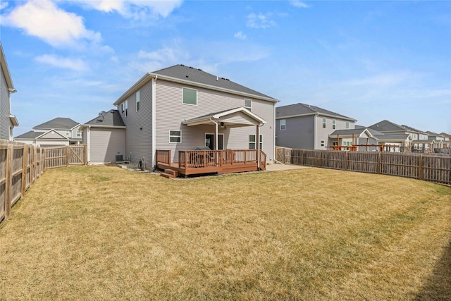 270 NE Prairie Wolf Dr, Waukee, IA 50263 - rear view of property featuring a wooden deck, a residential view, and central air condition unit