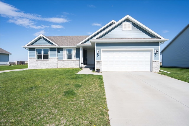view of front of home featuring concrete driveway, an attached garage, a front lawn, and stone siding