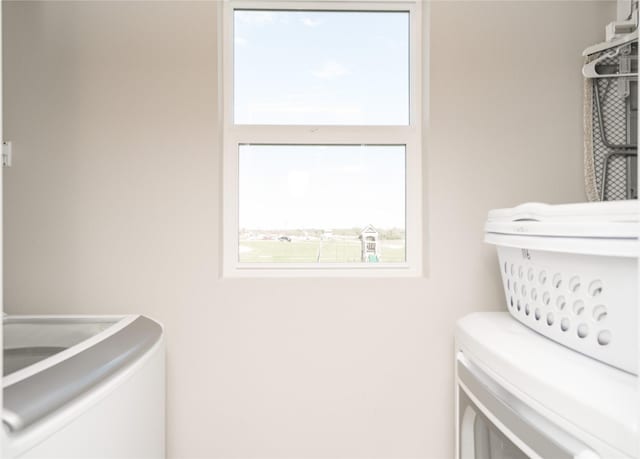 laundry room featuring laundry area and washer and clothes dryer