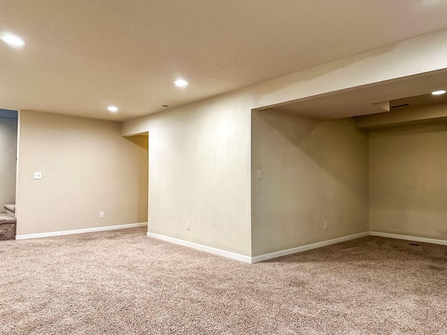 917 SE Allyn St, Ankeny, IA 50021 - finished below grade area with carpet floors, baseboards, and recessed lighting