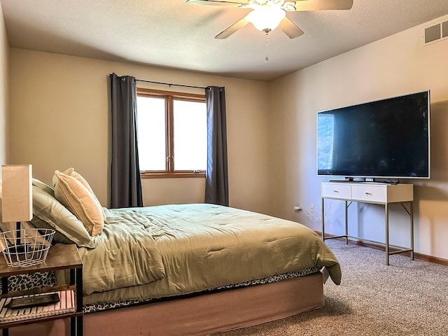 917 SE Allyn St, Ankeny, IA 50021 - carpeted bedroom featuring visible vents, baseboards, and a ceiling fan