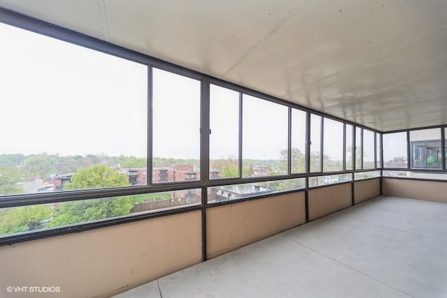 unfurnished sunroom with a healthy amount of sunlight