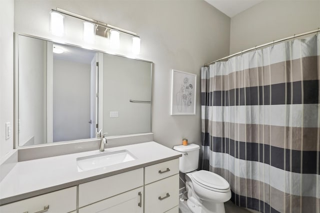 full bathroom with vanity, toilet, and a shower with shower curtain