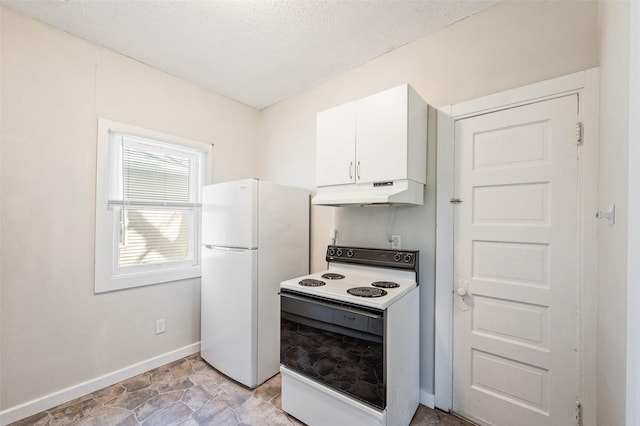 kitchen featuring white appliances, a textured ceiling, under cabinet range hood, white cabinetry, and baseboards