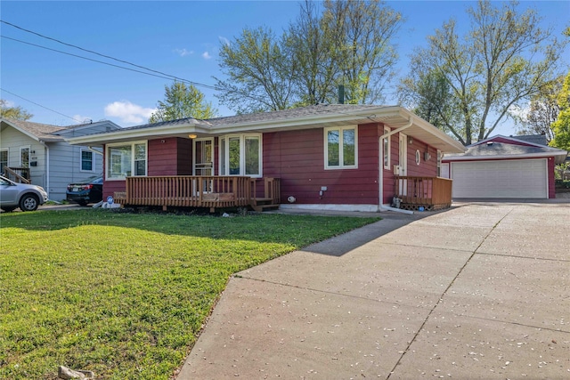 single story home featuring an outdoor structure, a detached garage, and a front yard
