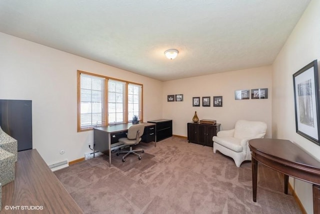 carpeted office with baseboards and visible vents