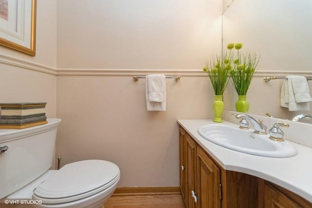 half bath with toilet and vanity