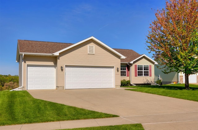 4520 147th St, Urbandale, IA 50323 - single story home featuring a front lawn, driveway, roof with shingles, and a garage