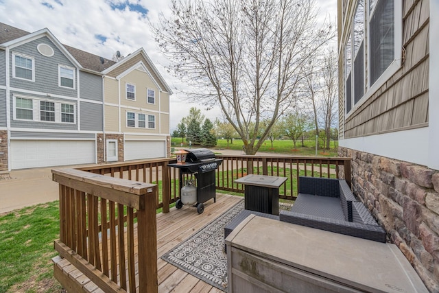 wooden terrace with a grill