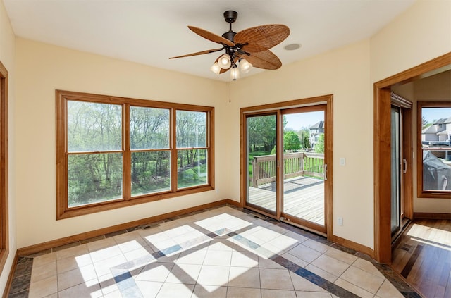 3803 SW 2nd Ct, Ankeny, IA 50023 - entryway featuring baseboards, a ceiling fan, and light tile patterned floors