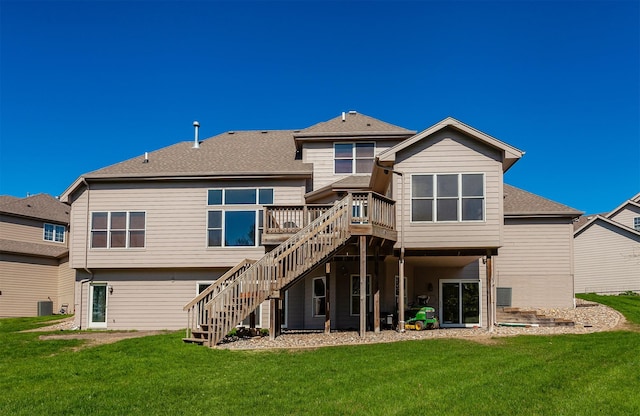 3803 SW 2nd Ct, Ankeny, IA 50023 - rear view of property with stairs, a deck, a lawn, and a shingled roof