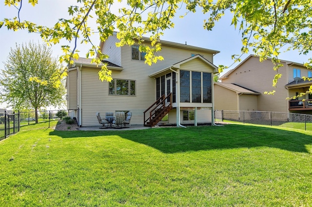 3414 163rd St, Urbandale, IA 50323 - back of property featuring a sunroom and a patio area