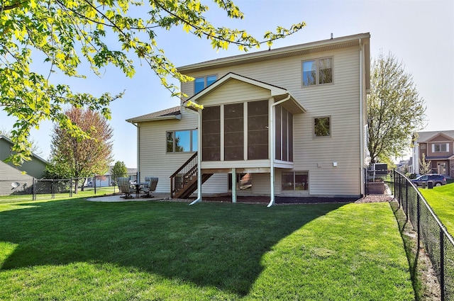 3414 163rd St, Urbandale, IA 50323 - back of property featuring a sunroom and a patio area