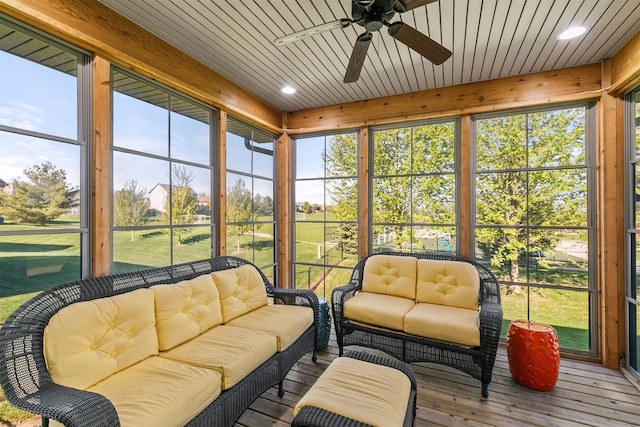 3414 163rd St, Urbandale, IA 50323 - sunroom / solarium with a ceiling fan and an outdoor hangout area