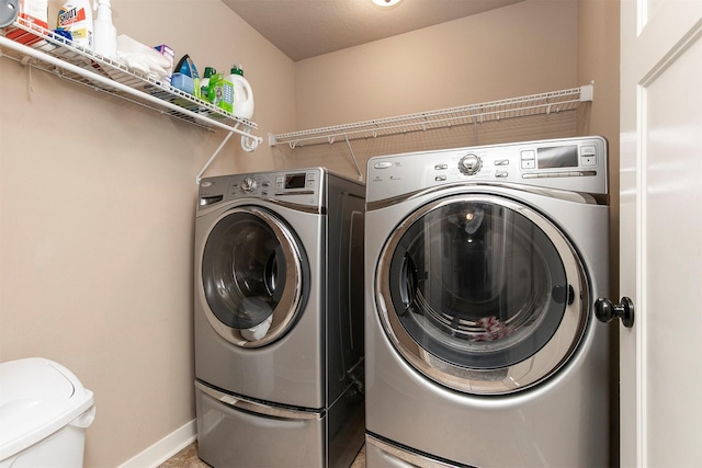 3414 163rd St, Urbandale, IA 50323 - washroom with independent washer and dryer and baseboards