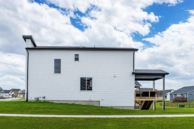 730 NE Country Meadow Dr, Ankeny, IA 50021 - back of house with a yard, a deck, and stairs