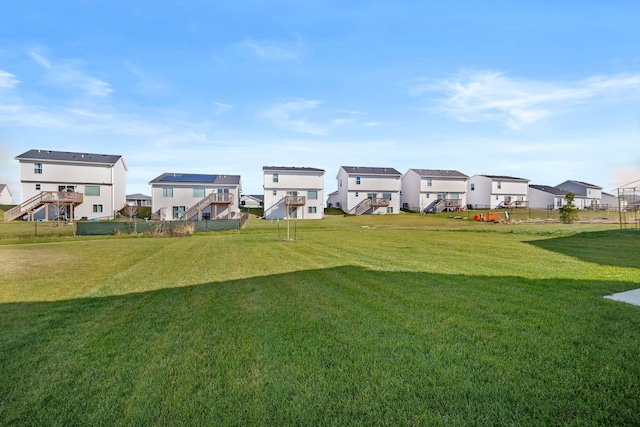 view of yard featuring a residential view