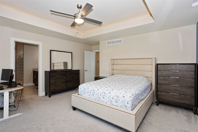 465 NW Gracewood Dr, Waukee, IA 50263 - bedroom featuring light carpet, a tray ceiling, a ceiling fan, and an office area